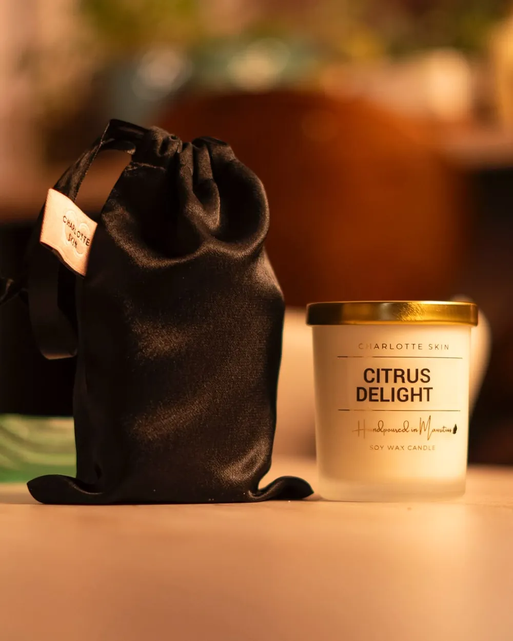 Bougie Citrus Delight Charlotte Skin et son pochon satin